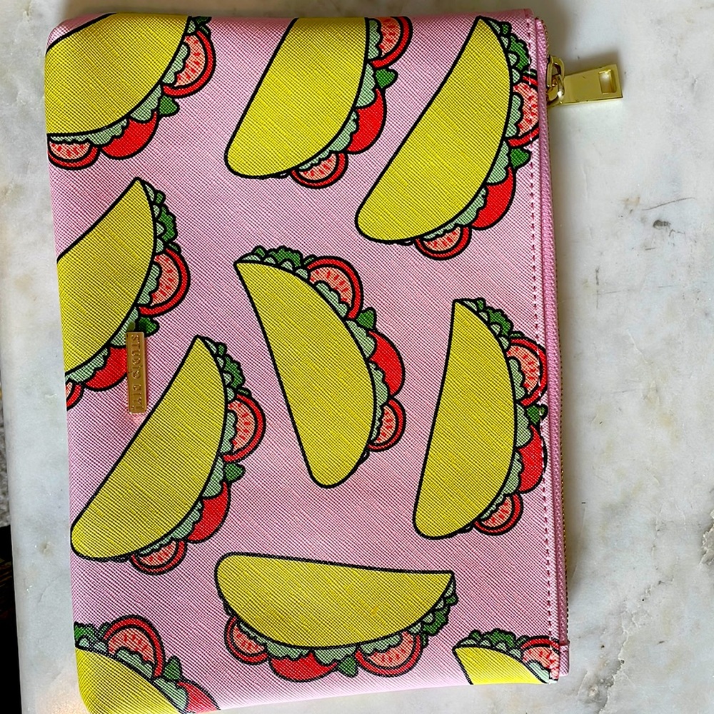 A small, taco design, cosmetic pouch or a carry around.
